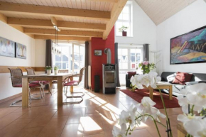 Schwalbennest Greetsiel für bis zu 6 Personen mit Kaminofen, Whirlpool und Sauna - Haustiere herzlich willkommen, nah am Hafen